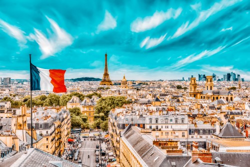 Beautiful panoramic view of Paris from the roof of the Pantheon. View of the Eiffel Tower and flag of France.